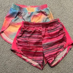 Two pairs of girls 7/8 shorts, with attached undies. Nike and All in Motion.